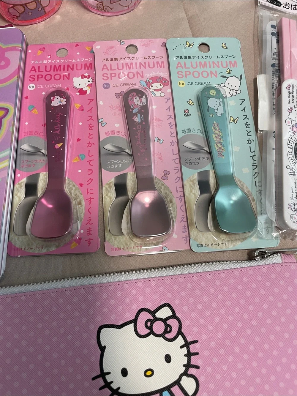 Sanrio Bundle: includes cups, utensils, notebook and zippered pouch.
